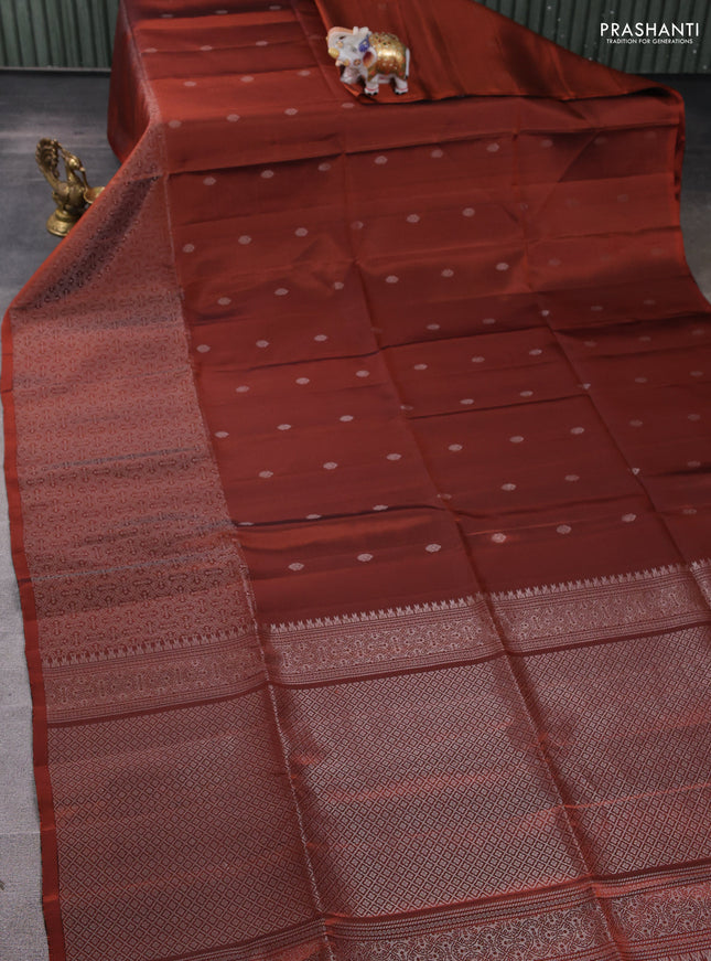 Pure soft silk saree rust shade with silver zari woven buttas and rich silver zari woven border