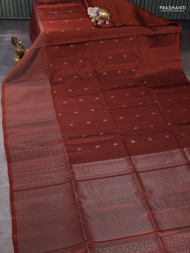 Pure soft silk saree rust shade with silver zari woven buttas and rich silver zari woven border