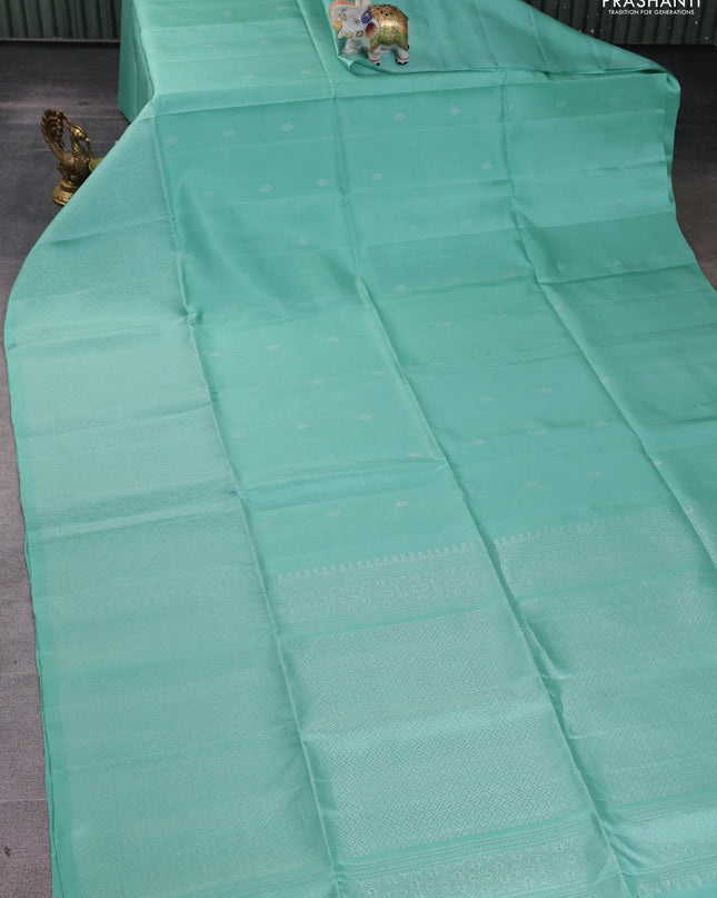 Pure soft silk saree pastel shade with silver zari woven buttas and rich silver zari woven border