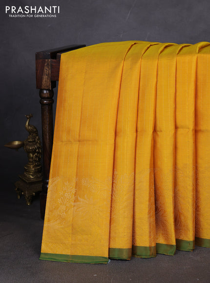 Pure soft silk saree mustard yellow and green with allover zari weaves and simple border