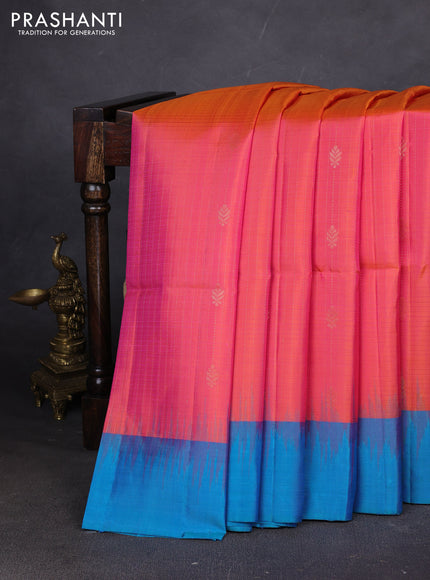 Pure soft silk saree dual shade of pinkish orange and cs blue with allover zari weaves and simple border