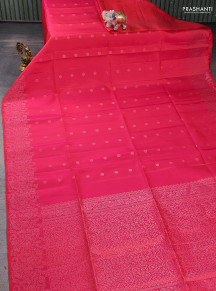 Pure soft silk saree dual shade of pinkish orange with silver zari woven buttas and rich silver zari woven border