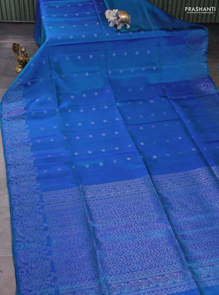 Pure soft silk saree dual shade of teal blue with silver zari woven buttas and rich silver zari woven border