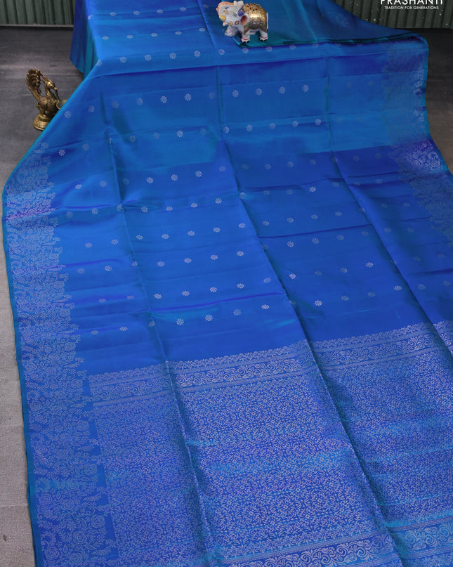 Pure soft silk saree dual shade of teal blue with silver zari woven buttas and rich silver zari woven border