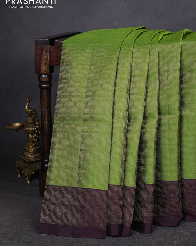 Pure soft silk saree light green and deep jamun with allover brocade weaves and zari woven border
