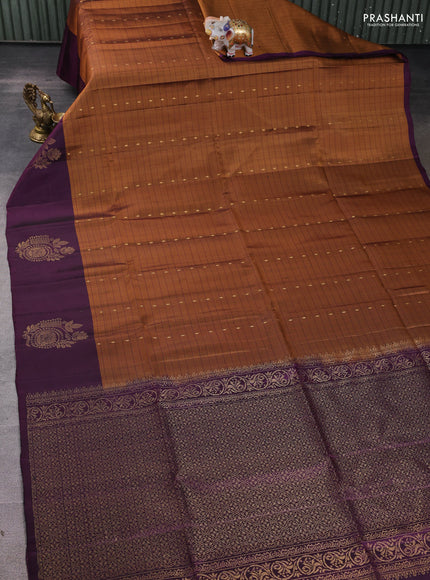 Pure soft silk saree dark rust and wine shade with allover zari checks & buttas and zari woven butta border