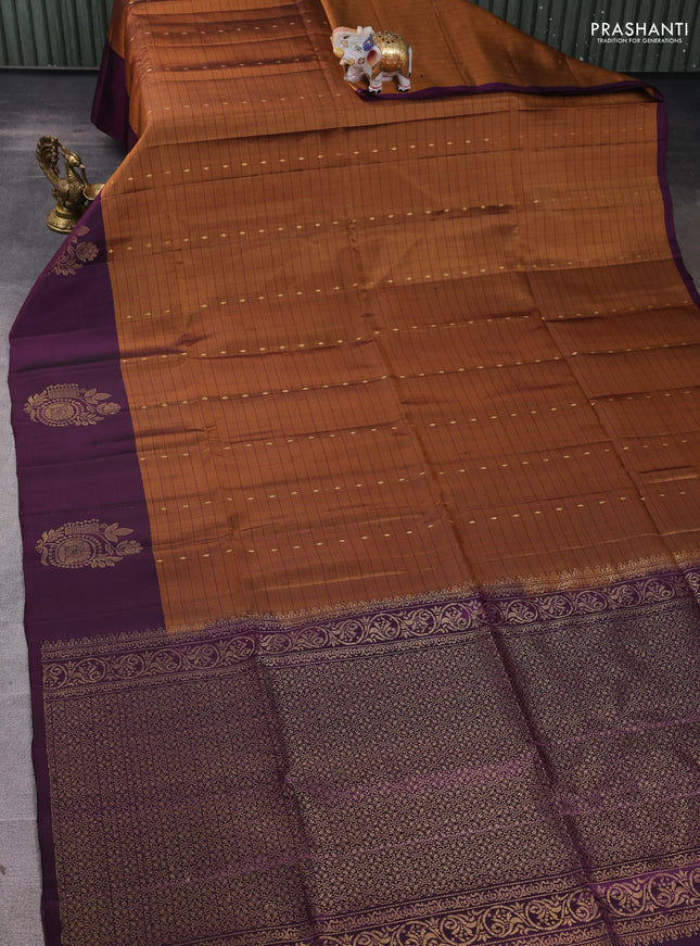 Pure soft silk saree dark rust and wine shade with allover zari checks & buttas and zari woven butta border