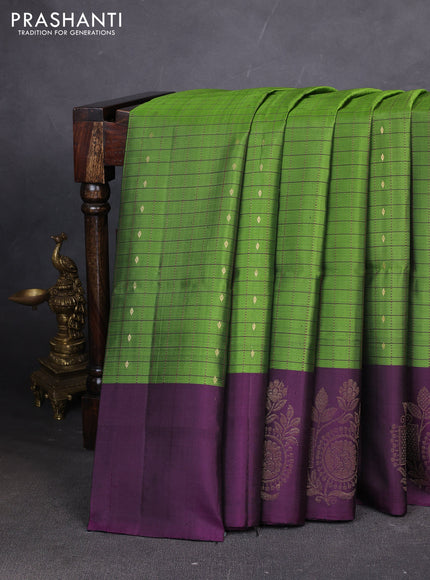 Pure soft silk saree green and deep wine with allover zari checks & buttas and zari woven butta border