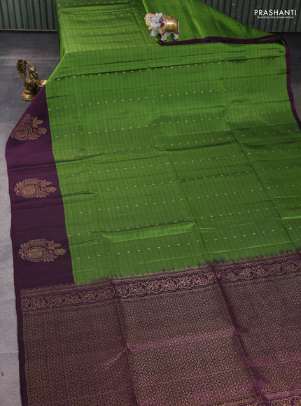 Pure soft silk saree green and deep wine with allover zari checks & buttas and zari woven butta border