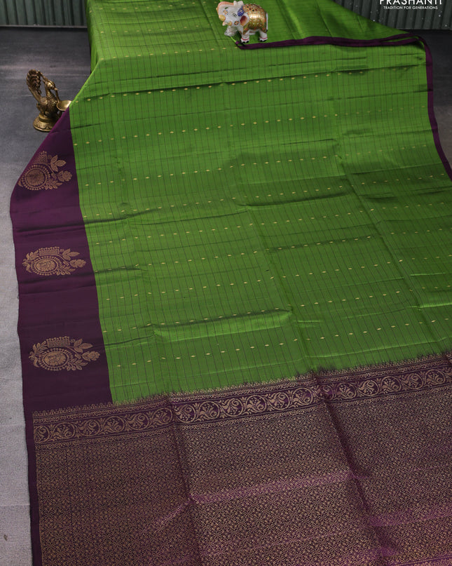 Pure soft silk saree green and deep wine with allover zari checks & buttas and zari woven butta border