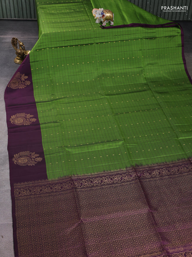 Pure soft silk saree green and deep wine with allover zari checks & buttas and zari woven butta border