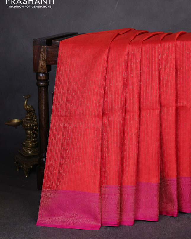 Pure soft silk saree orange and pink with allover zari weaves and zari woven border