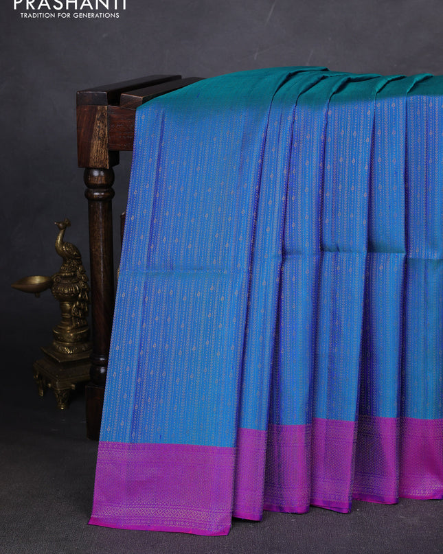 Pure soft silk saree teal blue and purple with allover zari weaves and zari woven border
