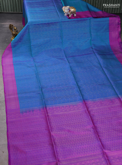 Pure soft silk saree teal blue and purple with allover zari weaves and zari woven border