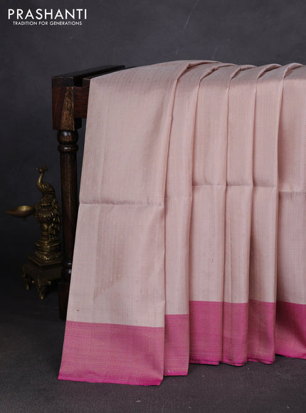 Pure soft silk saree beige and pink shade with allover zari weaves and zari woven border