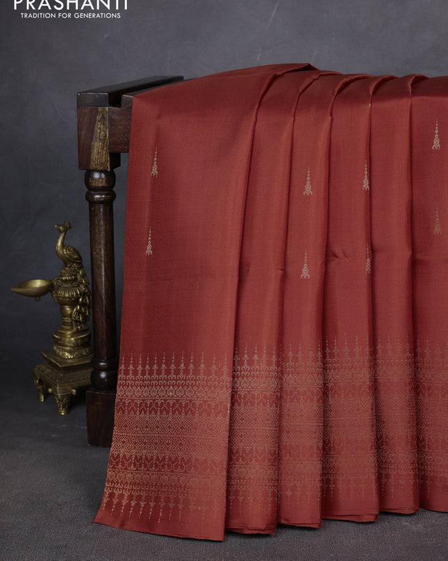 Pure soft silk saree rustic orange with zari woven buttas and zari woven border