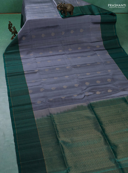Pure soft silk saree grey and teal green with zari woven buttas and zari woven checked border