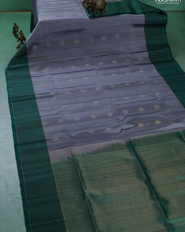 Pure soft silk saree grey and teal green with zari woven buttas and zari woven checked border