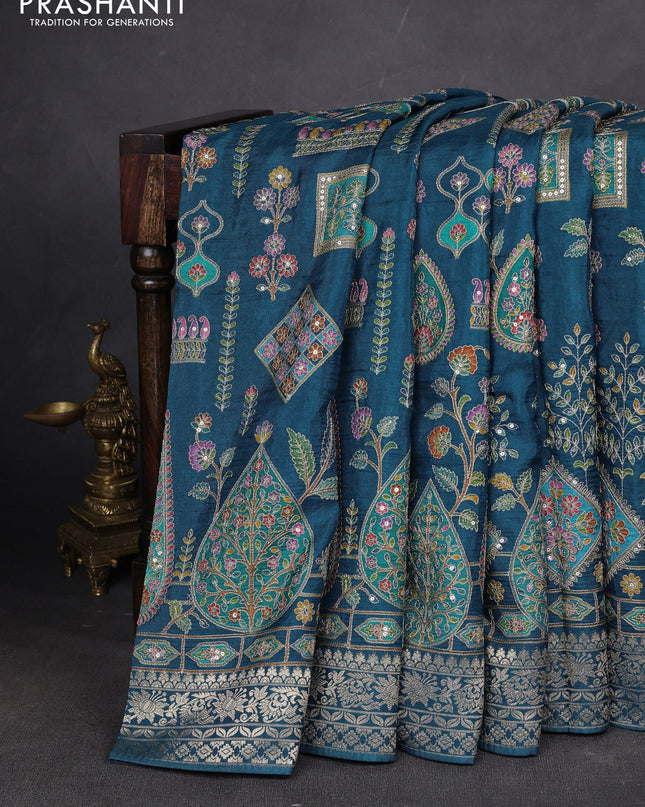 Crepe silk ssaree peacock blue with allover mina weaves & pita work and zari woven border