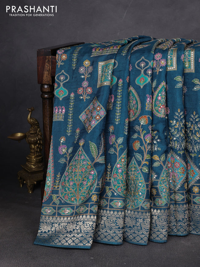 Crepe silk ssaree peacock blue with allover mina weaves & pita work and zari woven border