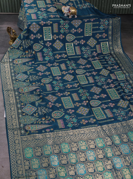 Crepe silk ssaree peacock blue with allover mina weaves & pita work and zari woven border