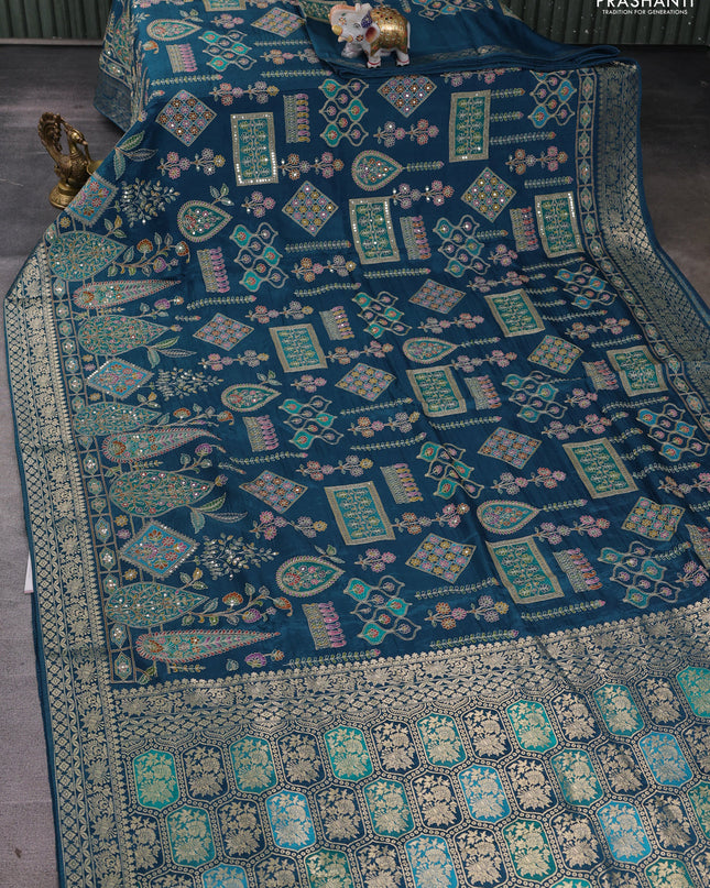 Crepe silk ssaree peacock blue with allover mina weaves & pita work and zari woven border