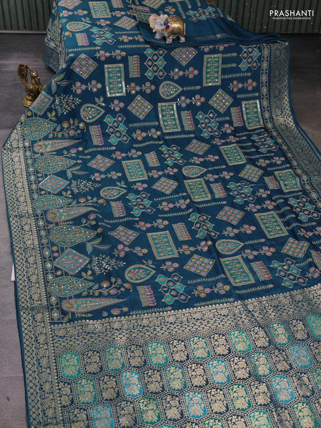 Crepe silk ssaree peacock blue with allover mina weaves & pita work and zari woven border