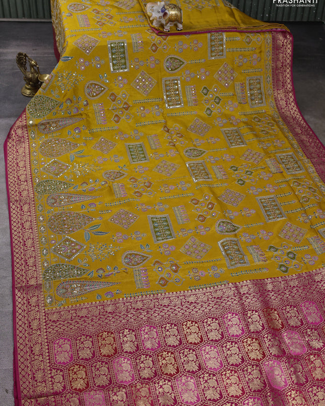 Crepe silk ssaree mustard yellow and pink with allover mina weaves & pita work and zari woven border