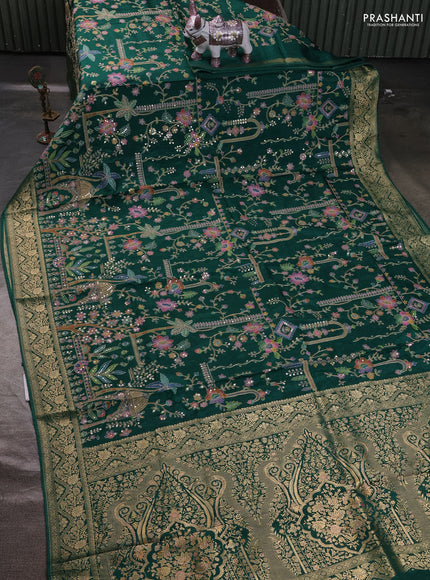 Crepe silk ssaree green with allover mina weaves & pita work and zari woven border