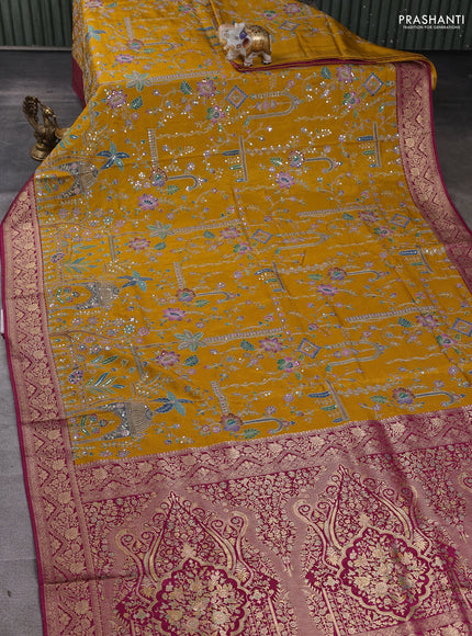 Crepe silk ssaree mustard yellow and pink with allover mina weaves & pita work and zari woven border