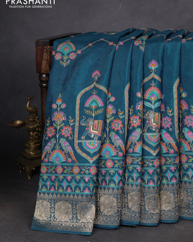 Crepe silk ssaree peacock blue with allover mina weaves & pita work and zari woven border