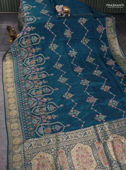 Crepe silk ssaree peacock blue with allover mina weaves & pita work and zari woven border
