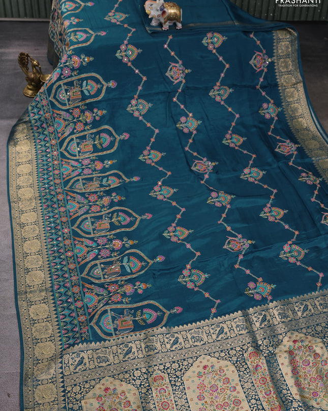 Crepe silk ssaree peacock blue with allover mina weaves & pita work and zari woven border