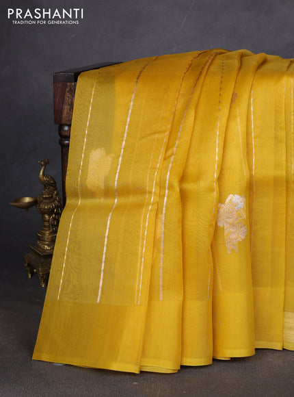 Pure banarasi Organza silk saree yellow with zari woven floral buttas in borderless style