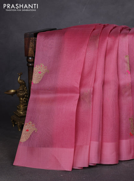 Pure banarasi Organza silk saree peach shade with woven buttas in borderless style