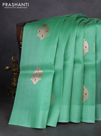 Pure banarasi Organza silk saree pastel green with zari woven buttas in borderless style