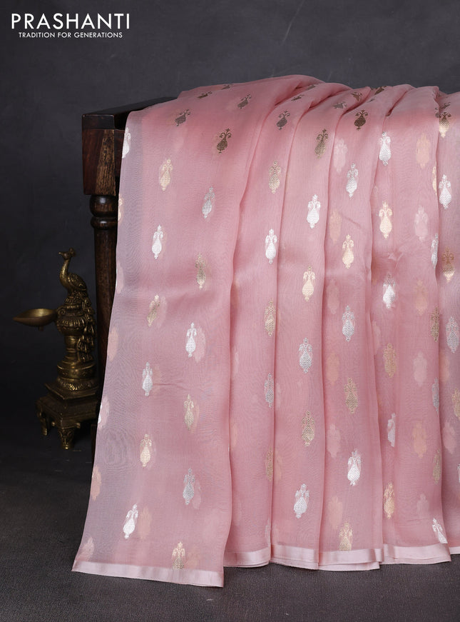 Pure banarasi Organza silk saree mild peach with silver & gold zari woven buttas and zari woven piping border