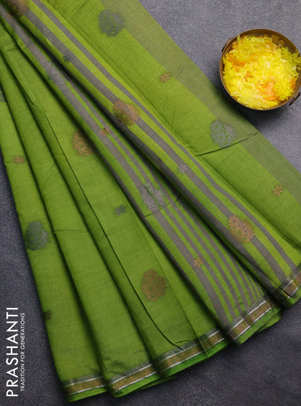 Semi raw silk saree light green with thread woven buttas and thread woven border