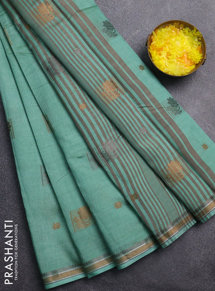 Semi raw silk saree pastel green with thread woven buttas and thread woven border