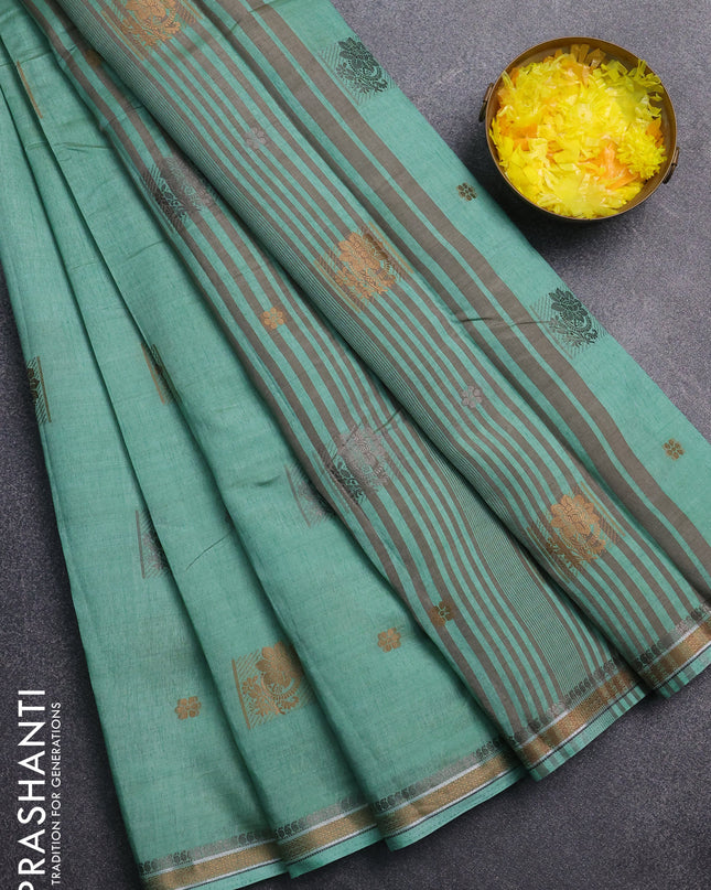 Semi raw silk saree pastel green with thread woven buttas and thread woven border