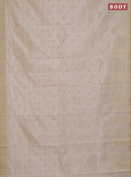 Semi raw silk saree cream with zari woven buttas and zari woven border