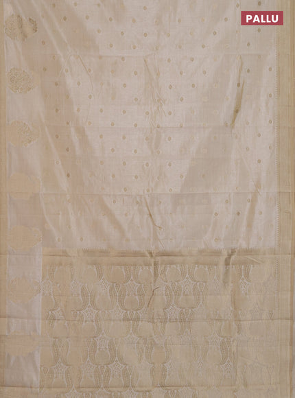 Semi raw silk saree cream with zari woven buttas and zari woven border