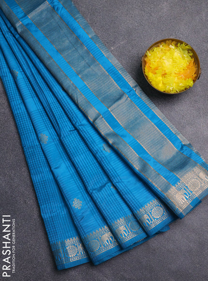 Semi raw silk saree cs blue with zari woven buttas and zari woven border