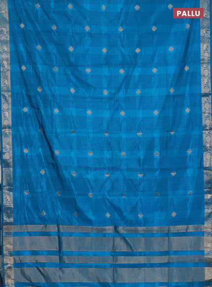 Semi raw silk saree cs blue with zari woven buttas and zari woven border