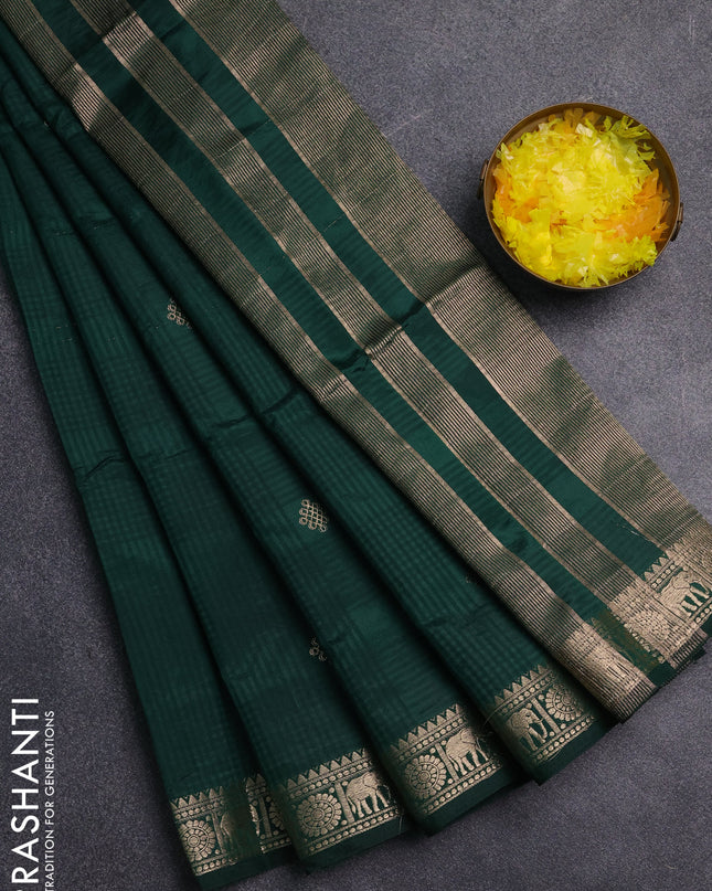 Semi raw silk saree dark green with zari woven buttas and zari woven border
