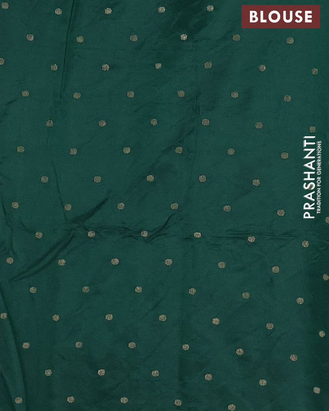 Semi raw silk saree dark green with zari woven buttas and zari woven border