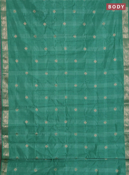 Semi raw silk saree pastel green with zari woven buttas and zari woven border