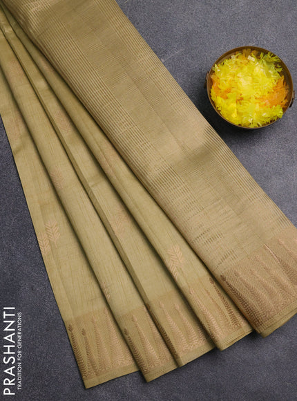 Semi raw silk saree pista green with zari woven buttas and zari woven border