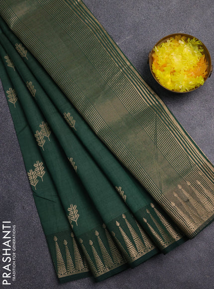 Semi raw silk saree green with zari woven buttas and zari woven border