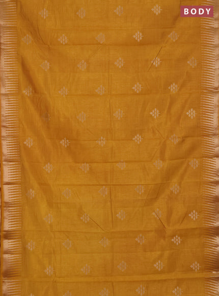 Semi raw silk saree mustard yellow with zari woven buttas and temple design zari woven border